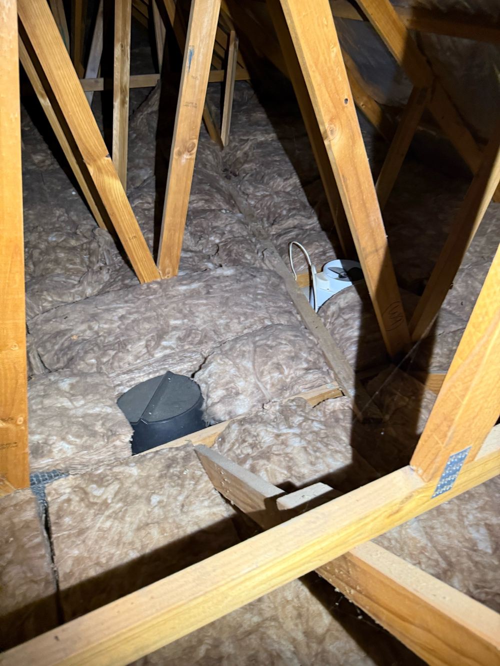 Bathroom fans venting steam into the roof void, found during a defect investigation in Berwick